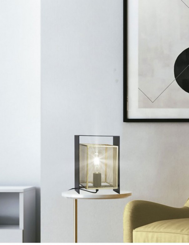 Lámpara de mesita con rejilla agujereada oro.